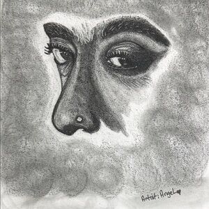 Angel's Charcoal Portrait with Black and Gray Hues